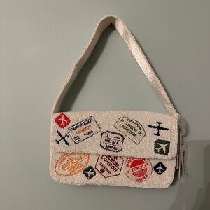 Viral passport beaded bag
